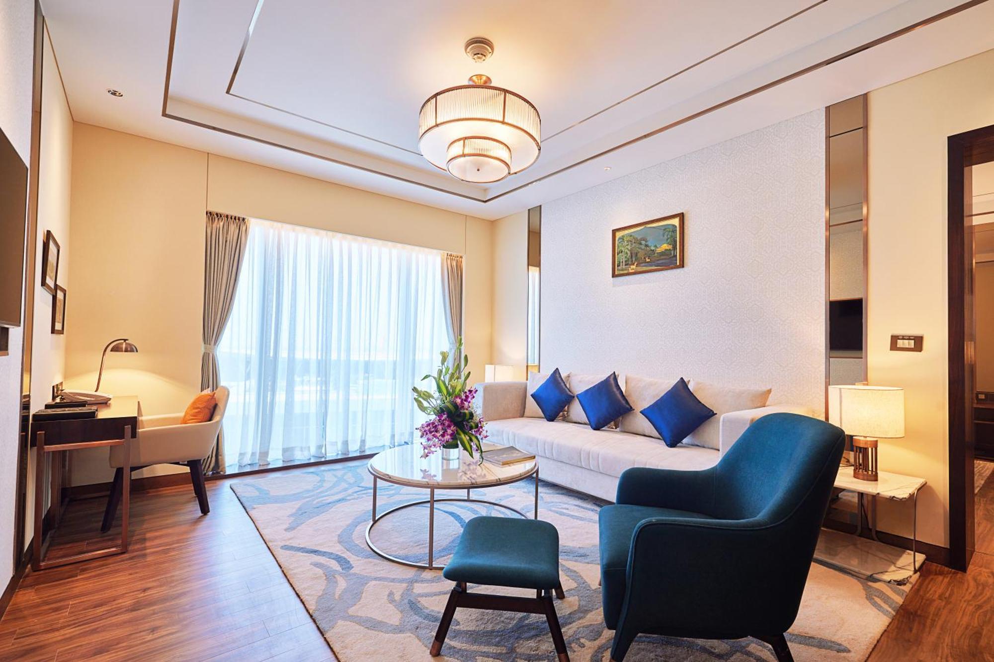 Taj Bangalore Devanahalli Exterior photo Living room of a suite at the hotel
