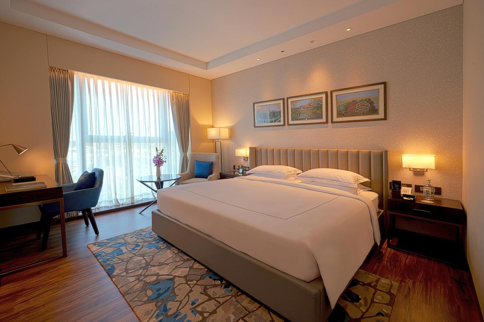 Taj Bangalore Devanahalli Exterior photo A bedroom at the Taj Bengal