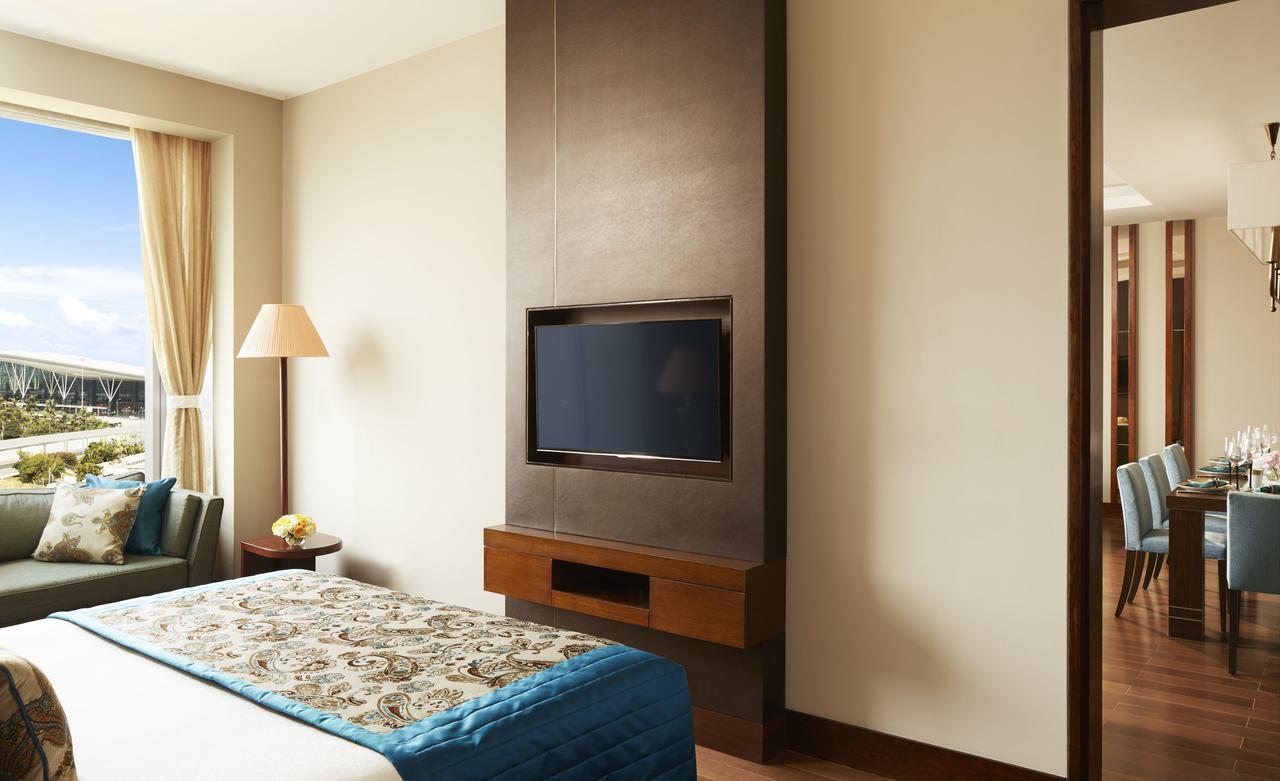 Taj Bangalore Devanahalli Exterior photo A television set in a hotel room