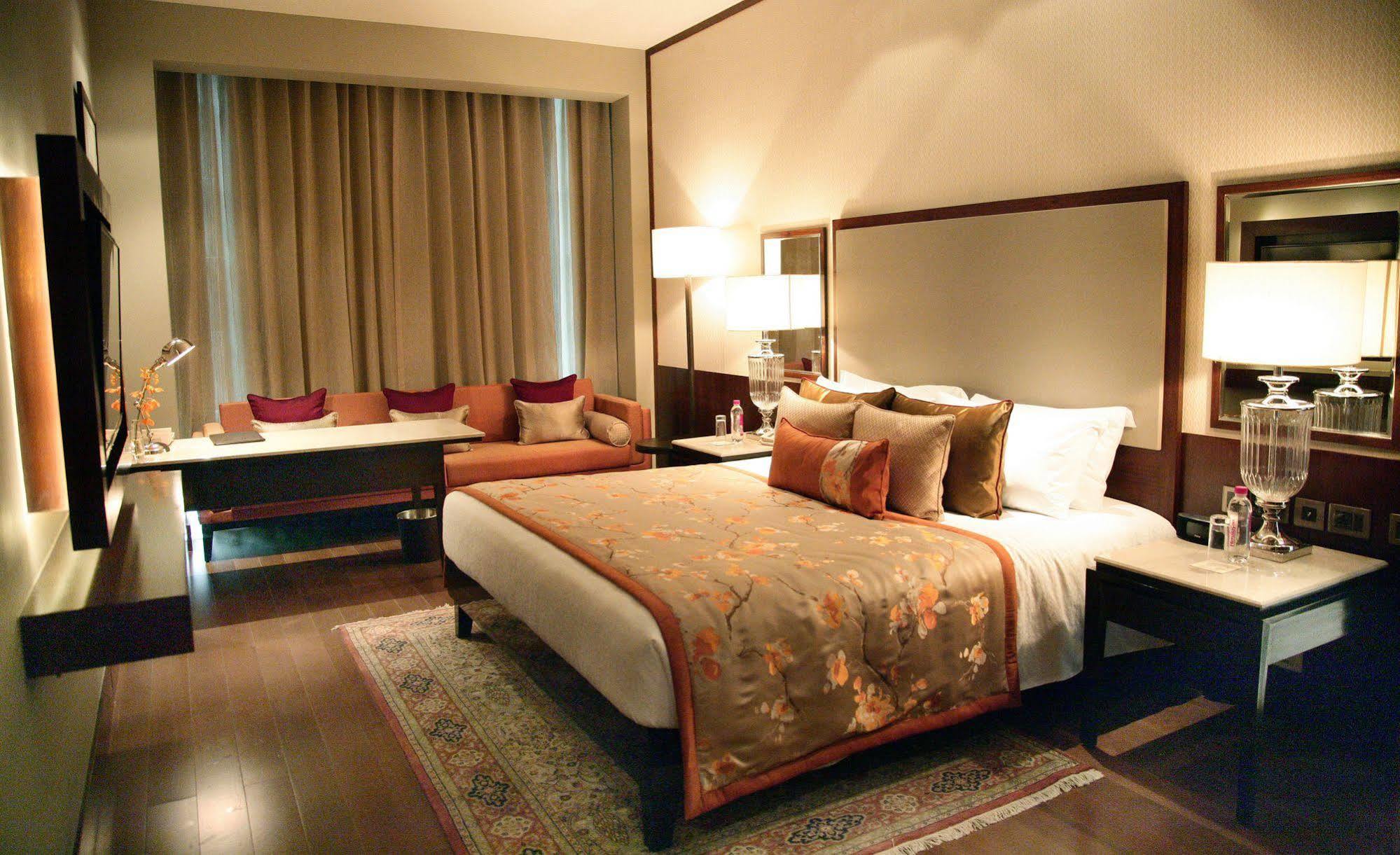 Taj Bangalore Devanahalli Exterior photo A bedroom at the Taj Mahal Palace, Mumbai