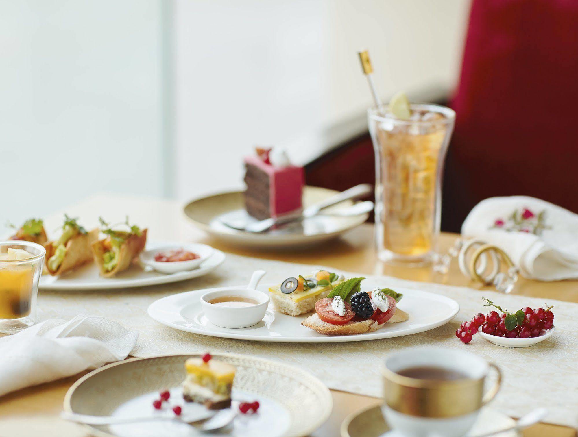 Taj Bangalore Devanahalli Exterior photo A typical afternoon tea